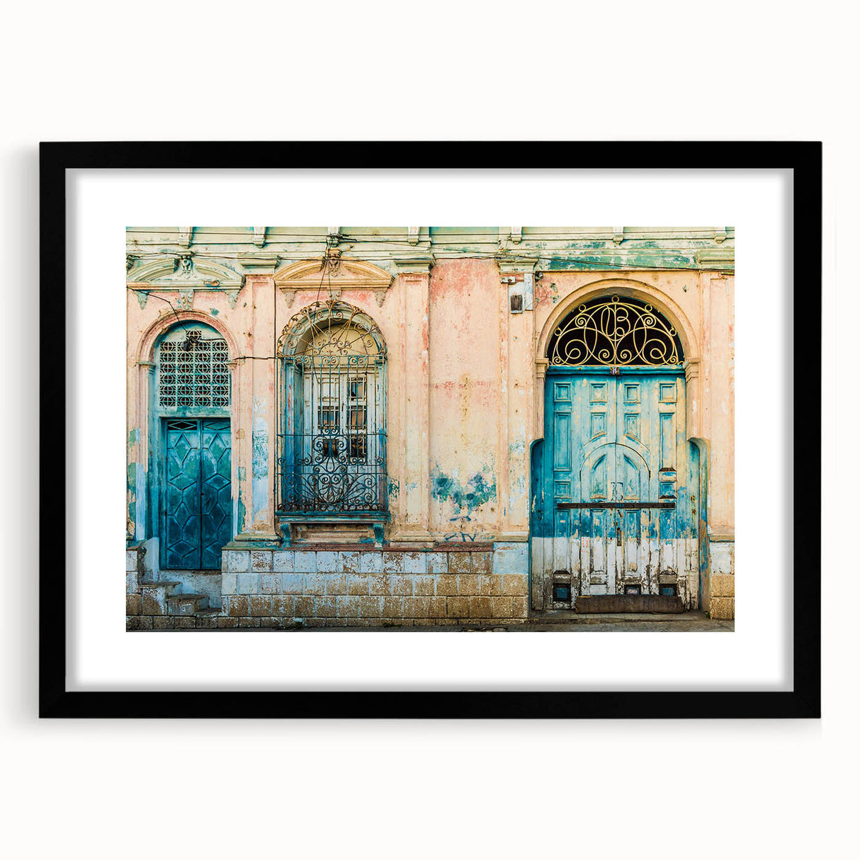 Extra large abstract art print of a colorful, textured Central American scenery, framed in black.