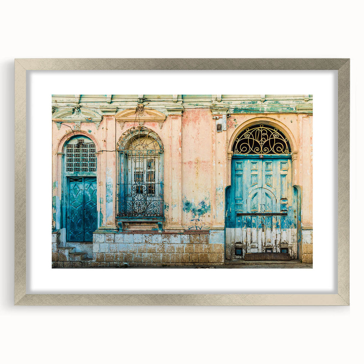 Textured abstract art print depicting a vibrant, colorful Central American landscape, framed in silver.