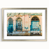 Textured abstract art print depicting a vibrant, colorful Central American landscape, framed in silver.