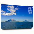 Large abstract wall art of a Nicaraguan landscape in vibrant greens and blues on acrylic glass.