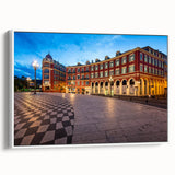 Vintage poster art of Nice, France in colorful hues on a large framed canvas, ideal for living room decor.