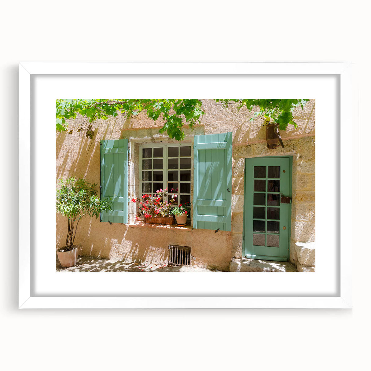 Textured art print of an abstract European scenery in muted earth tones, framed with a white mat, suitable for bedroom decor.
