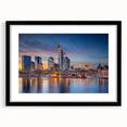 Extra large abstract art print of a vibrant, textured European scenery in a black frame, ideal for living room wall decor.