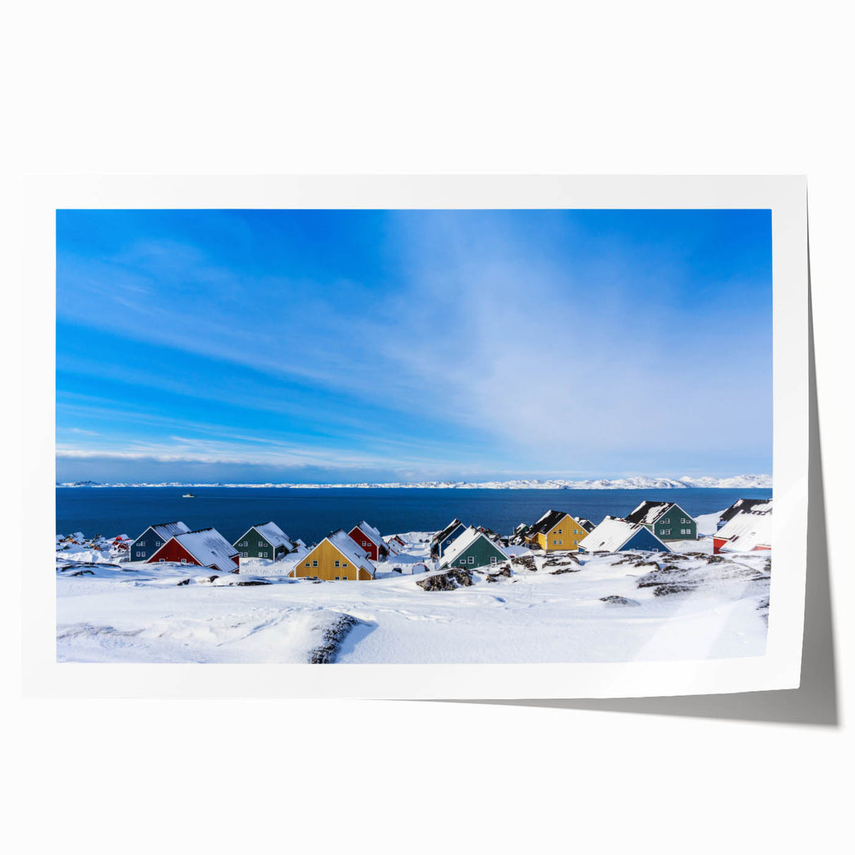 Rolled print of a Greenland landscape with lush greenery and distant mountains, ideal for dining room wall art.