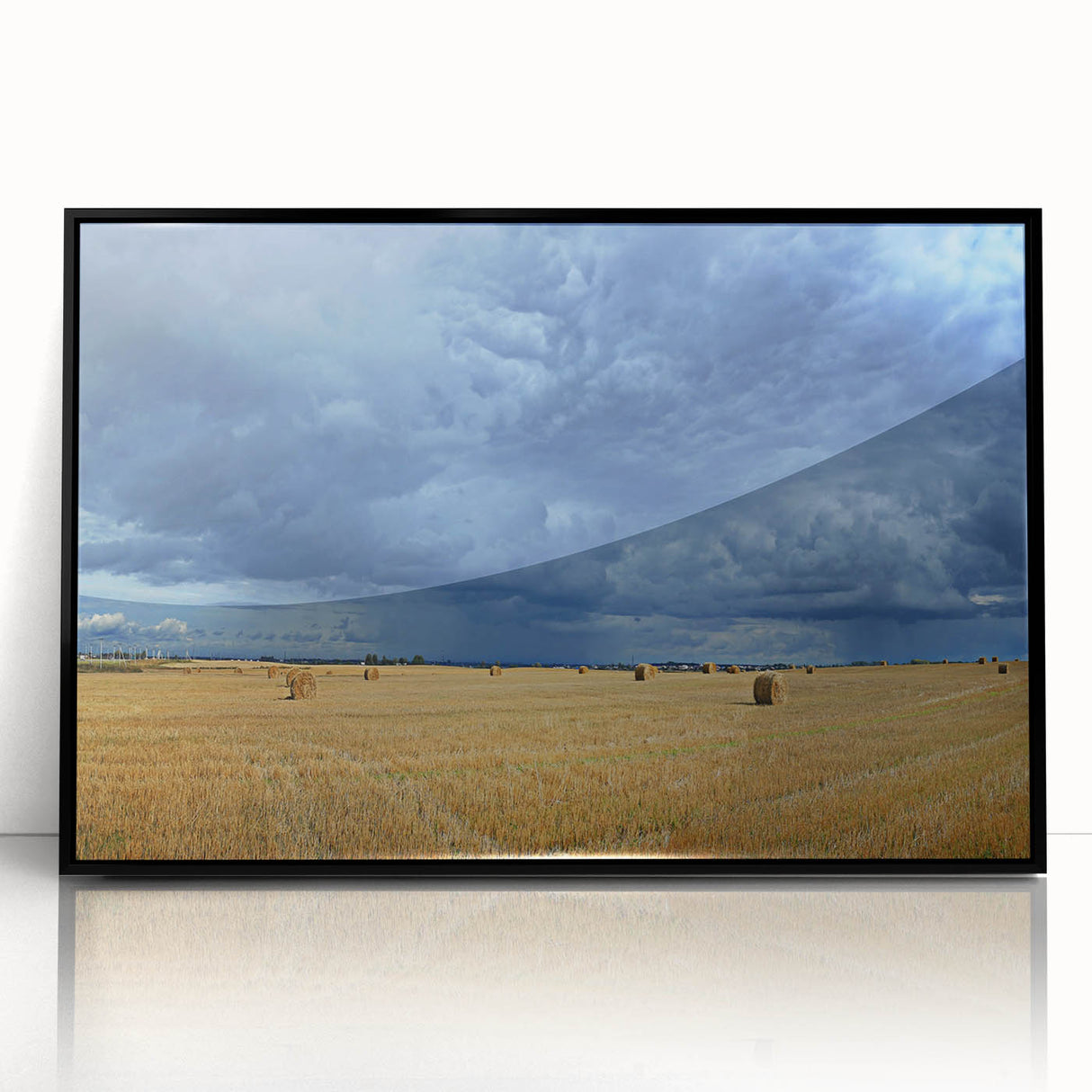 Large abstract wall art depicting a European cityscape in muted gray and blue tones, framed in black acrylic.