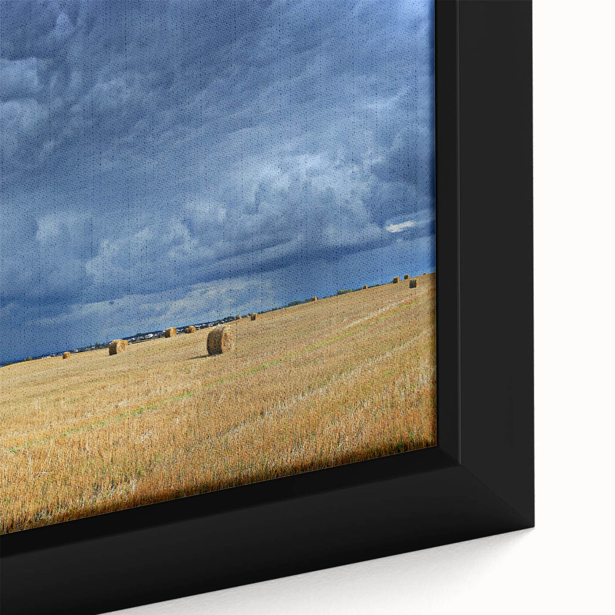 Framed canvas depicting a textured, colorful European cityscape with black borders, ideal for large living room walls.