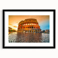 Extra large framed wall art of a colorful, abstract rendition of the Colosseum in Italy, ideal for living room decor.