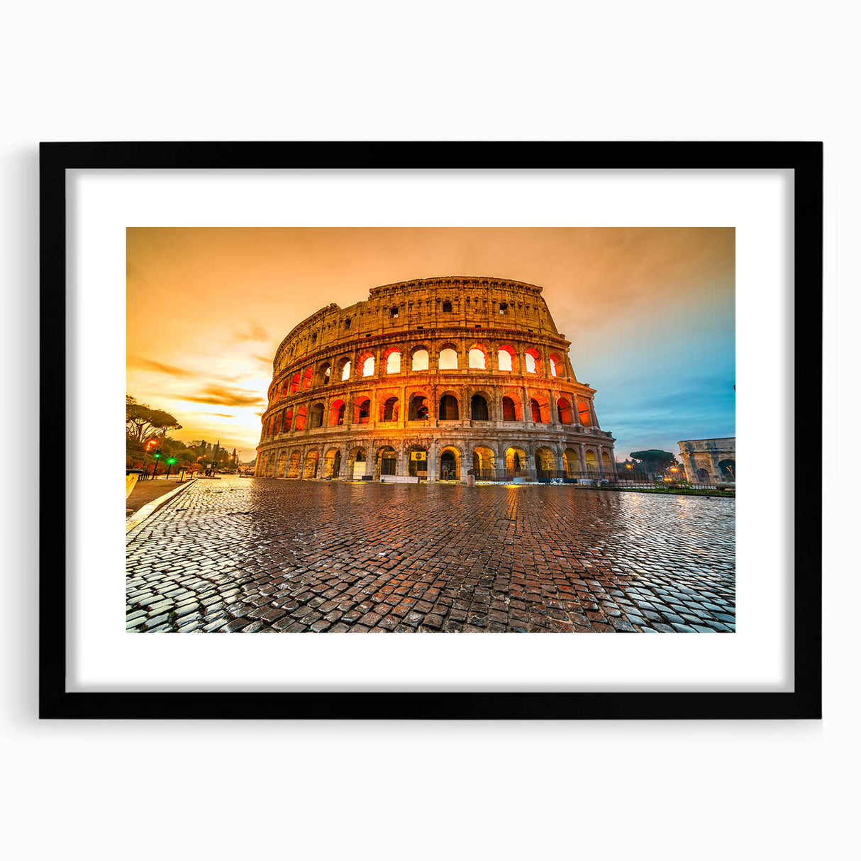 Extra large framed wall art of a colorful, abstract rendition of the Colosseum in Italy, ideal for living room decor.