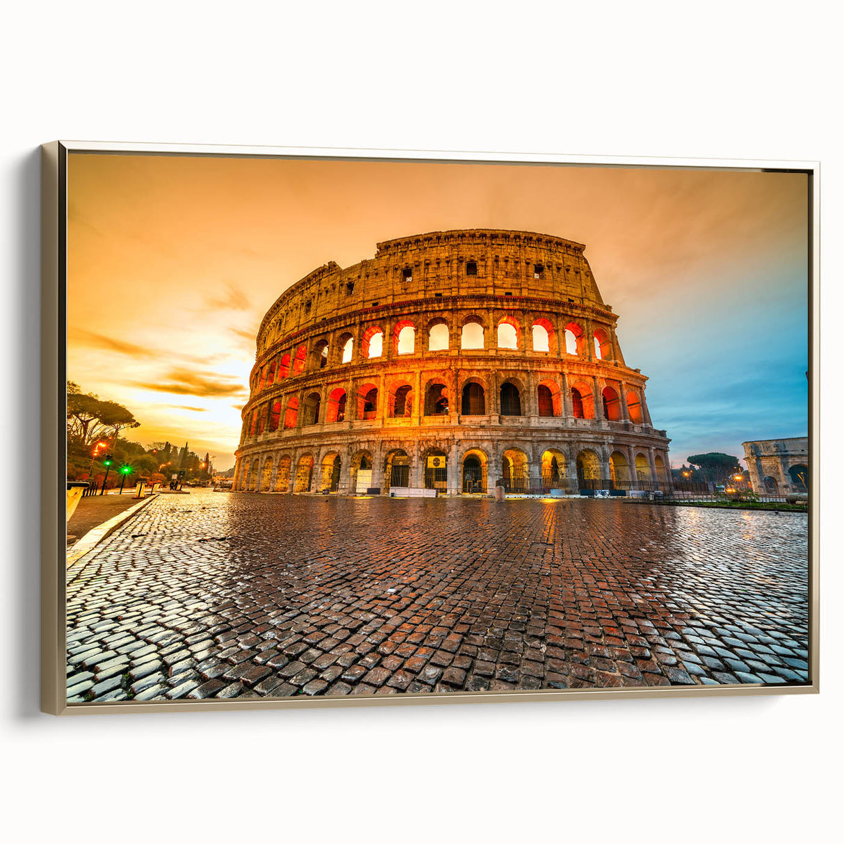 Framed canvas wall art featuring a vintage-style landscape of the Colosseum in muted gold and black tones.