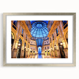 Extra large abstract art print of a Milan cityscape, featuring textured hues of gray and silver in a silver frame.