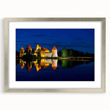 Extra large abstract art print of a European scenery in muted earth tones on a textured canvas, framed in silver.