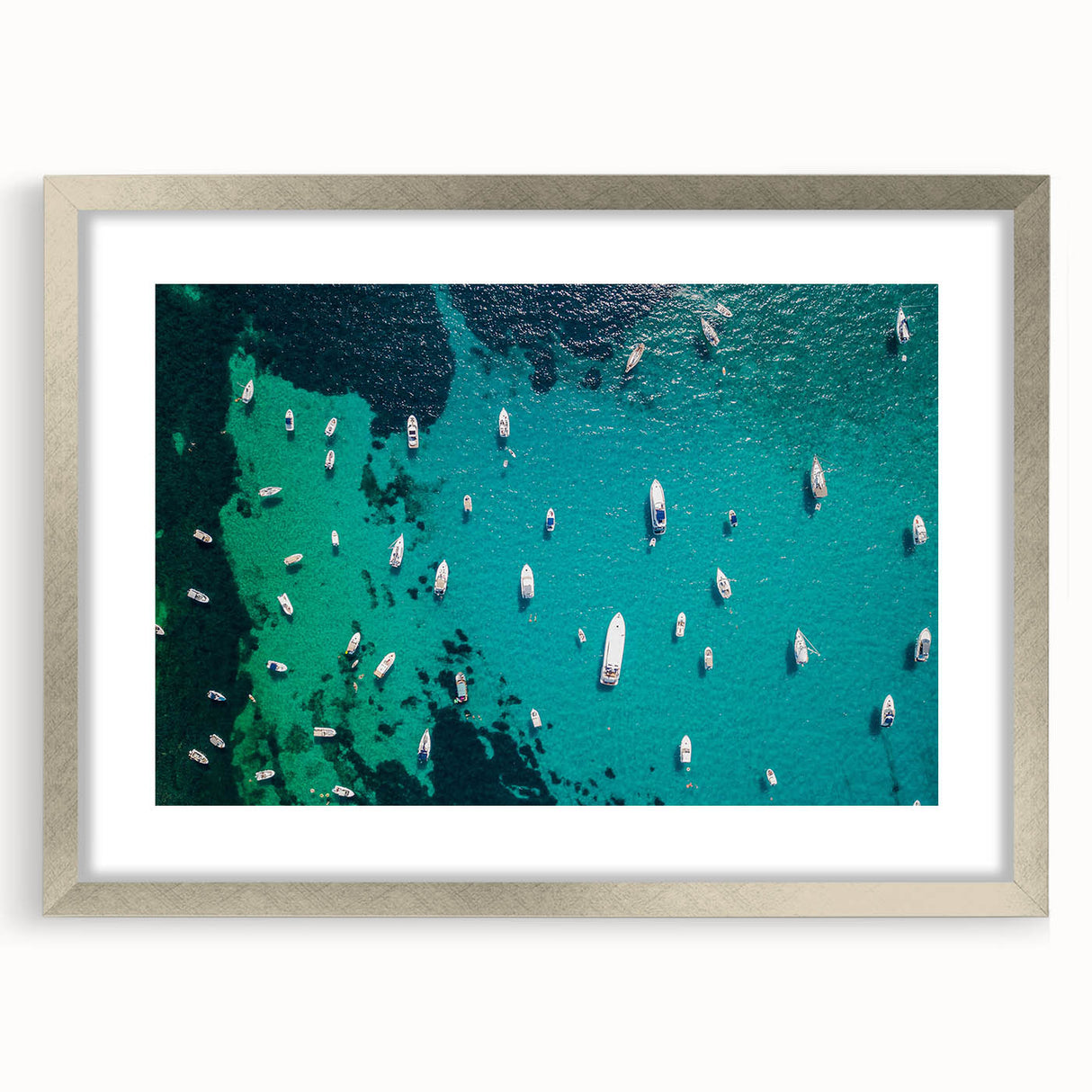 Extra large framed abstract art print depicting the Mediterranean Sea in textured blue and white tones.