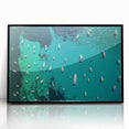 Large abstract wall art depicting the Mediterranean Sea in vibrant blue tones, framed in black acrylic.