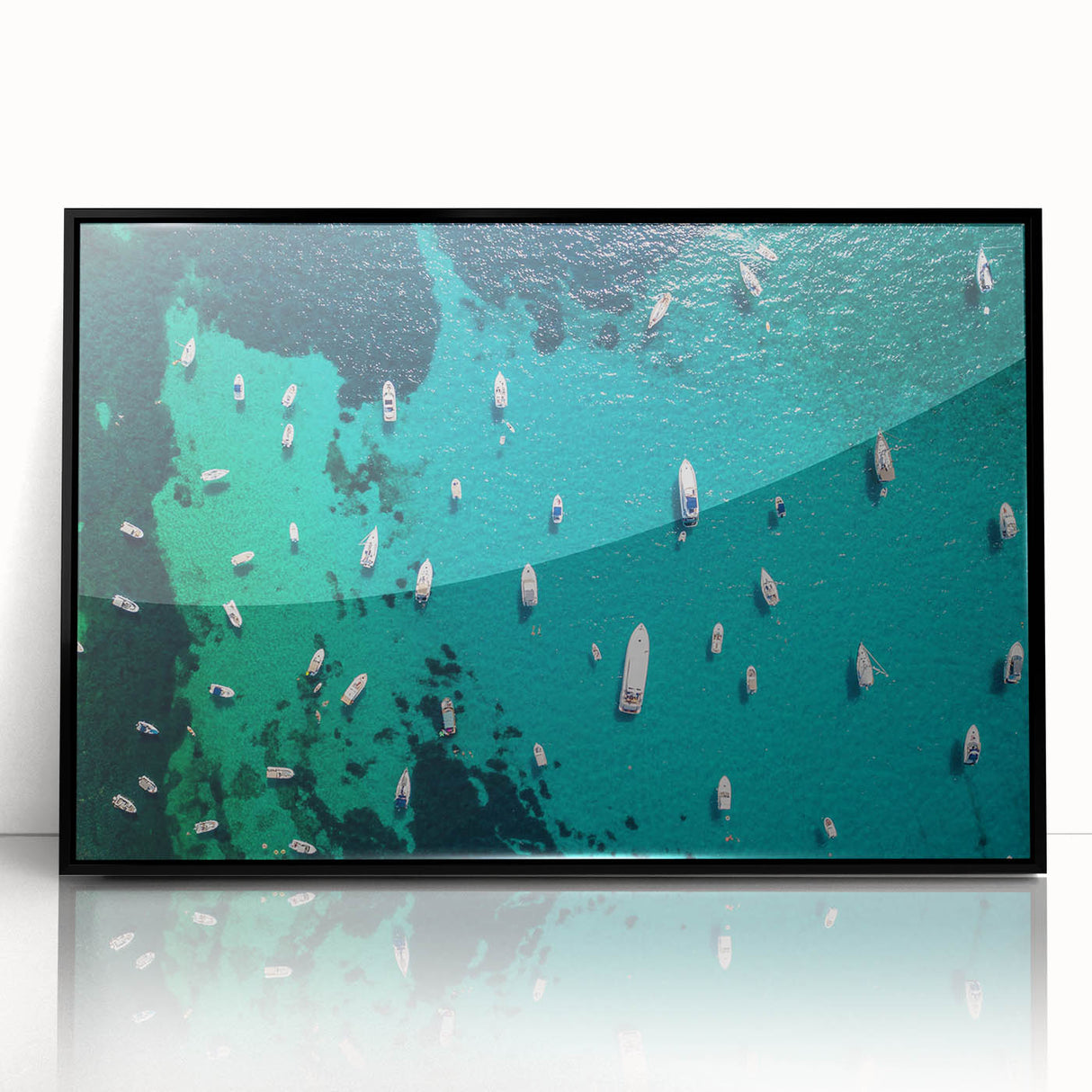 Large abstract wall art depicting the Mediterranean Sea in vibrant blue tones, framed in black acrylic.