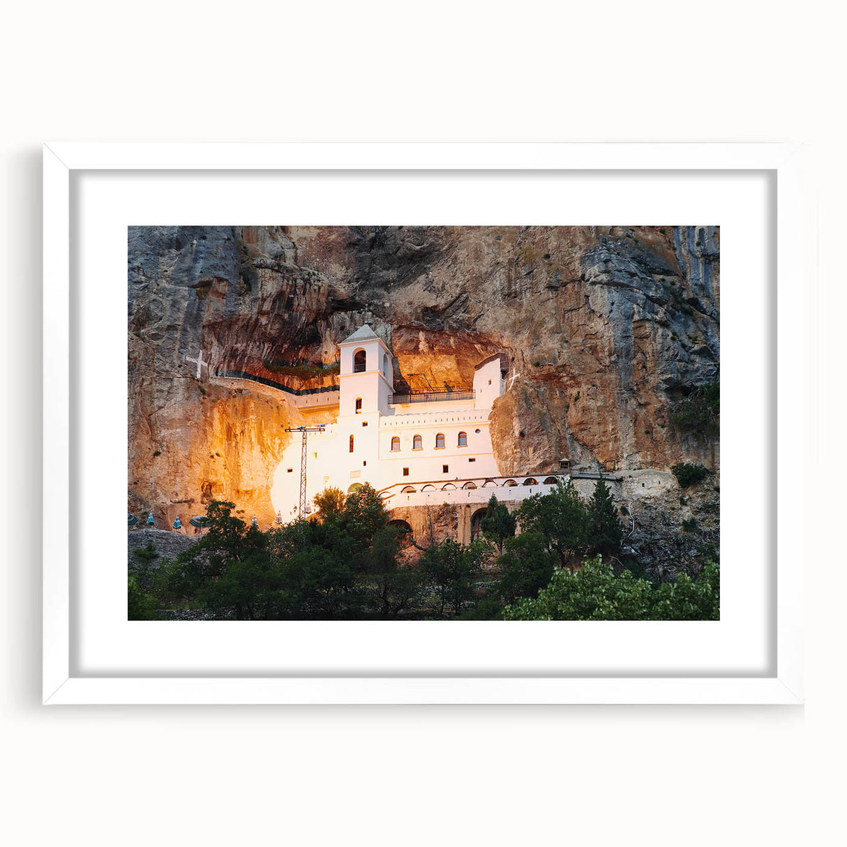 Textured art print of Montenegro scenery in abstract style with muted earth tones on a framed white mat.