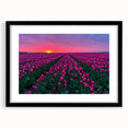 Colorful abstract art print of a European scenery in vibrant hues on a large textured canvas, framed in black.