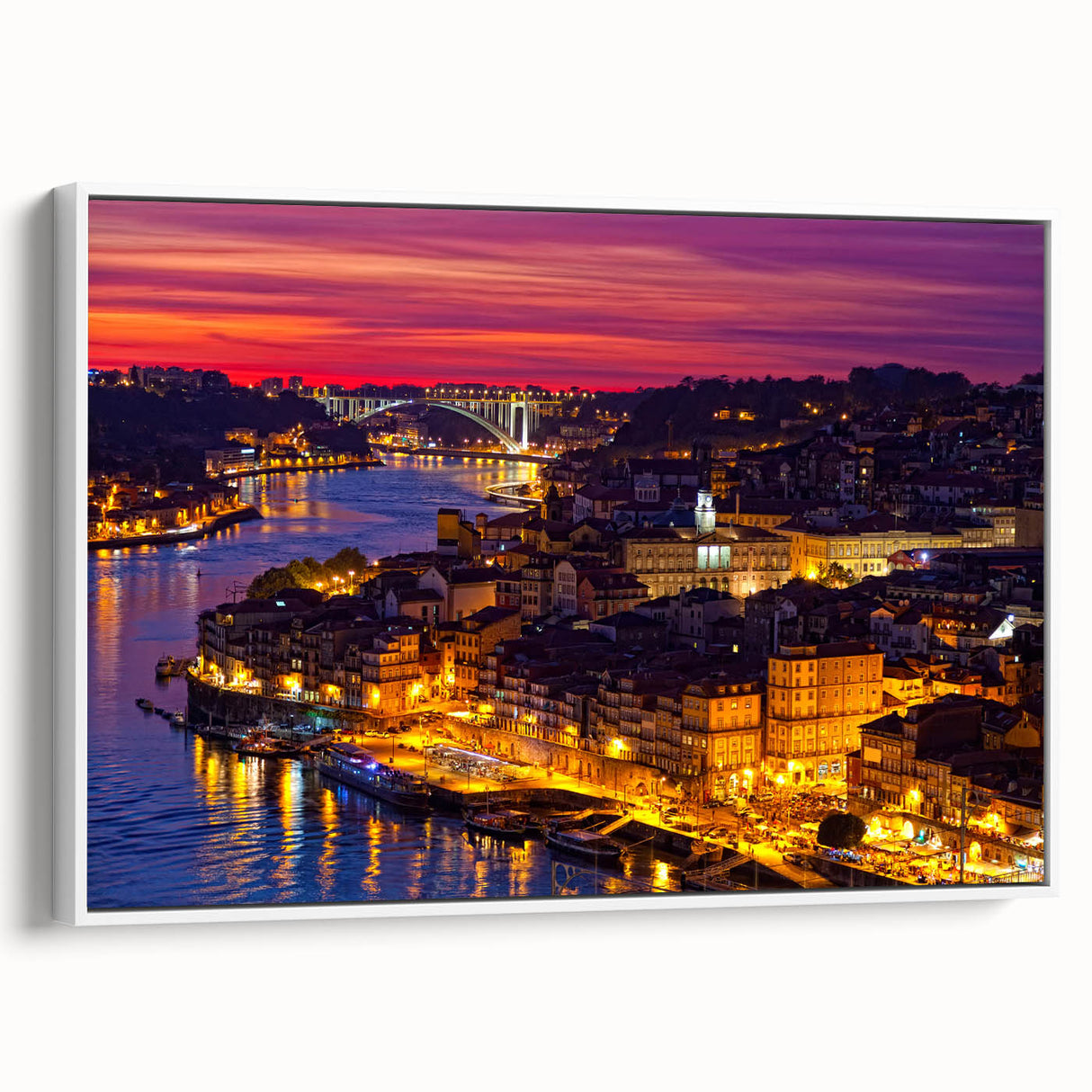 Vintage poster art of Porto, Portugal on framed canvas, featuring colorful architecture against a black sky.