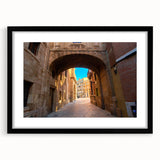 Extra large abstract art print of vibrant, colorful Spanish scenery on textured canvas, framed in black.