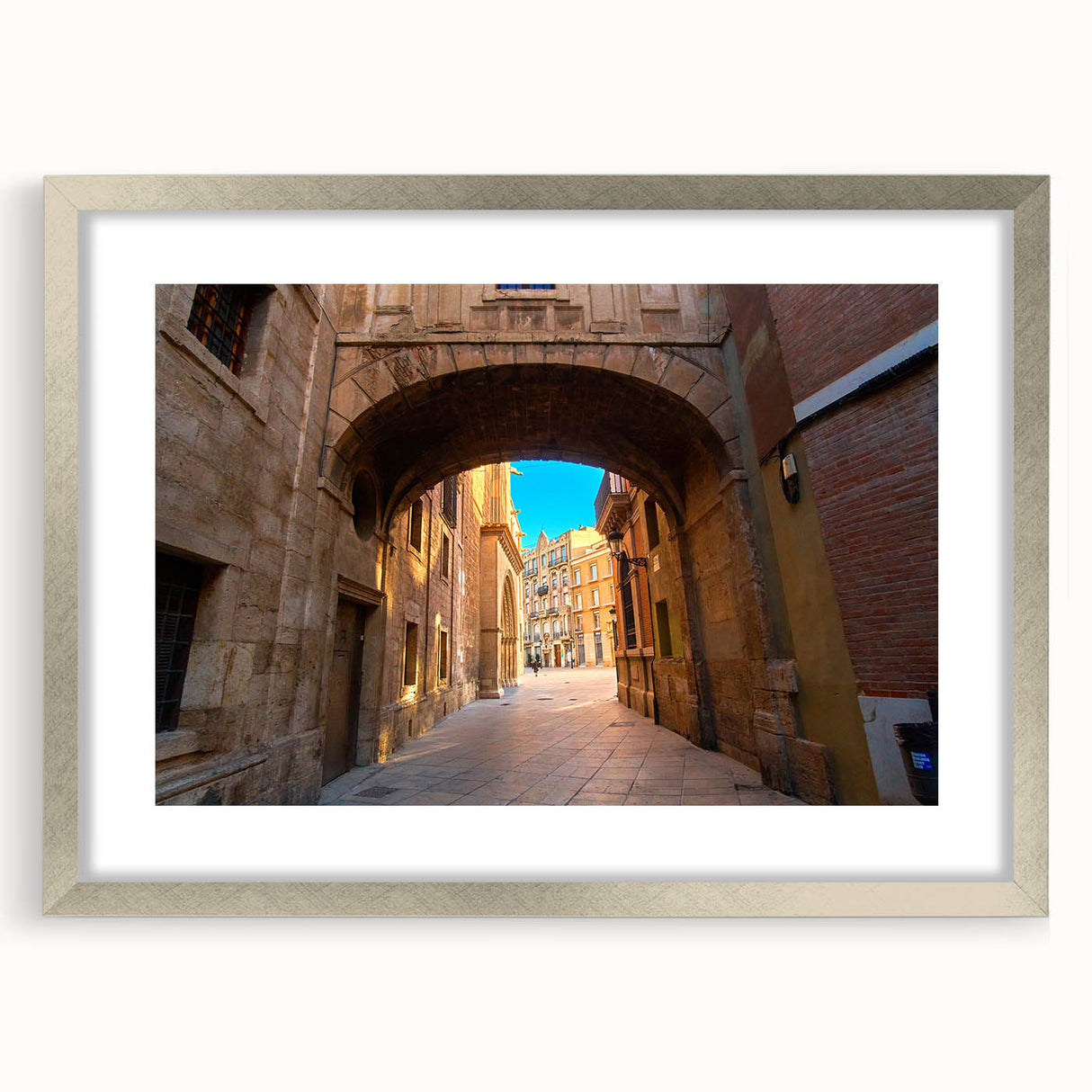 Textured abstract art print depicting a European scenery in muted earth tones, framed in silver, ideal for bedroom art.