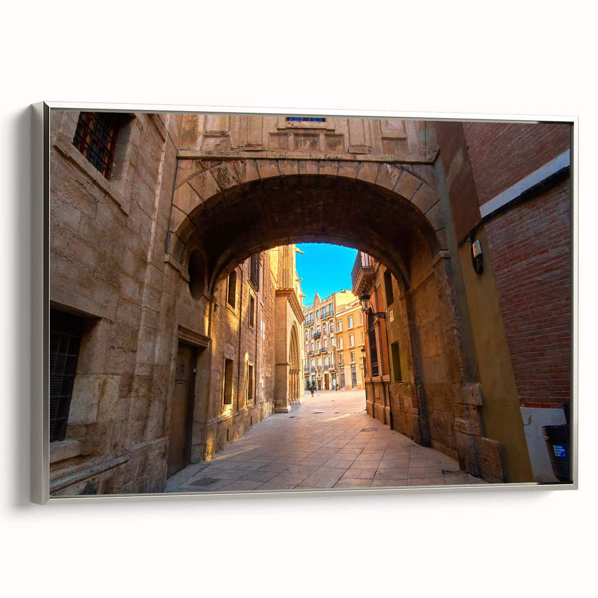 Framed canvas landscape art painting of Valencia featuring a blend of colorful and black vintage poster art elements.