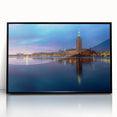 Large abstract wall art depicting the Stockholm skyline in muted gray and blue tones on a framed acrylic.