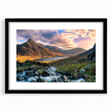 Abstract art print of a colorful Welsh landscape in vibrant hues on a large framed canvas, ideal for living room decor.
