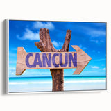 Vintage poster art of Cancun scenery on extra-large framed canvas, featuring colorful art against a black background.