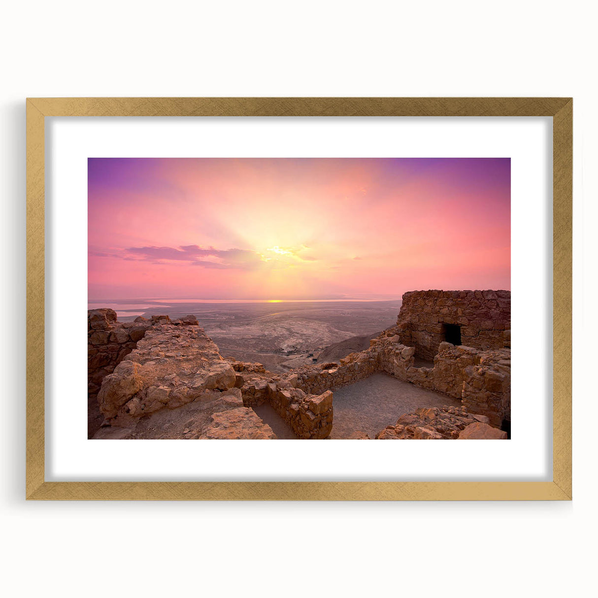 Extra large textured abstract art print depicting a Middle Eastern scenery in muted earth tones, framed in gold.