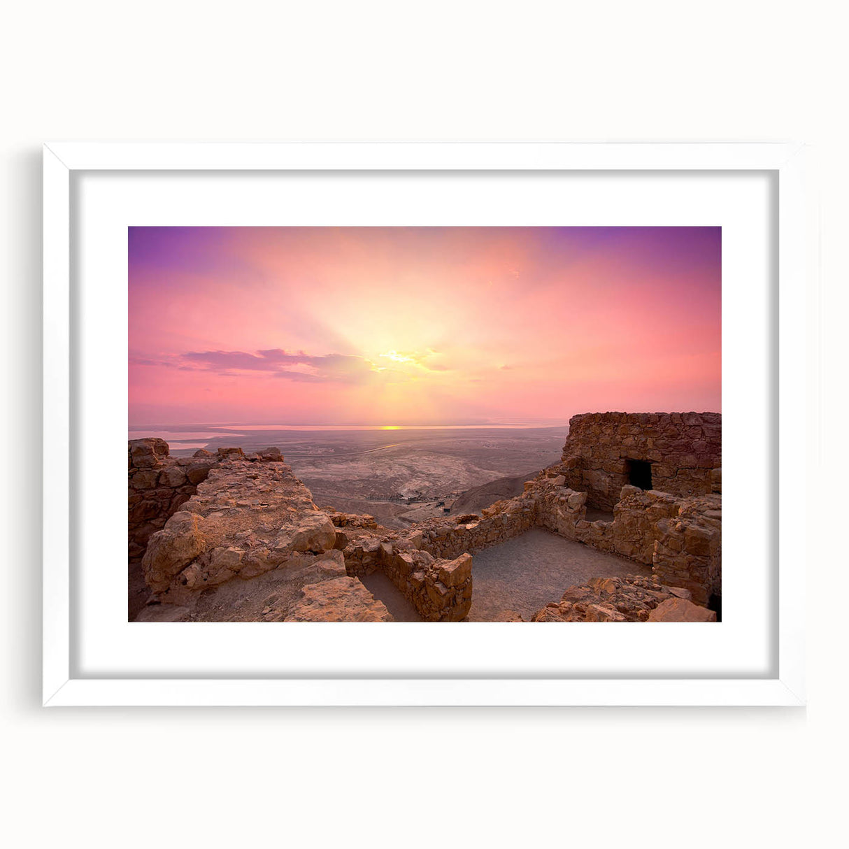 Abstract art print of a Middle Eastern scenery in muted earth tones on a framed white mat, ideal for dining room decor.