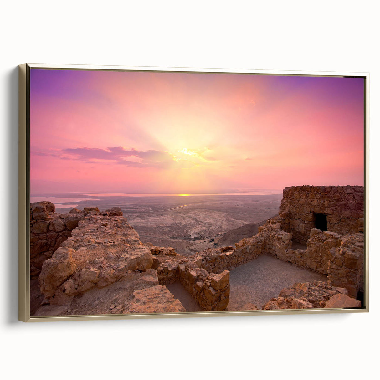 Framed canvas depicting a vintage-style Middle Eastern landscape in muted gold and black tones, ideal for bedroom wall decor.
