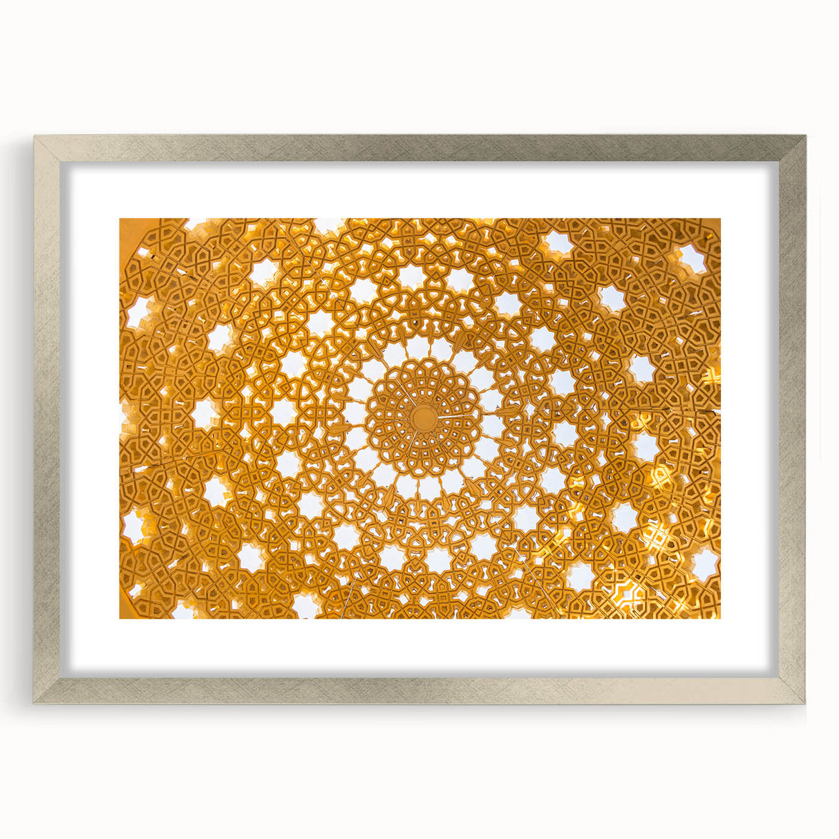 Abstract textured art print depicting Oman scenery in muted earth tones on a framed silver mat, suitable for bedroom decor.