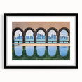 Extra large abstract art print of Middle Eastern scenery in colorful, textured hues on a black framed canvas.