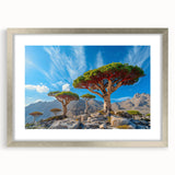Textured art print depicting an abstract Middle Eastern scenery in muted earth tones on a framed silver mat.