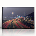 Large abstract wall art depicting Auckland's skyline in muted gray and blue tones on a framed acrylic.