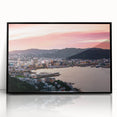 Large abstract wall art depicting Wellington, New Zealand in muted gray and blue tones on a framed acrylic print.