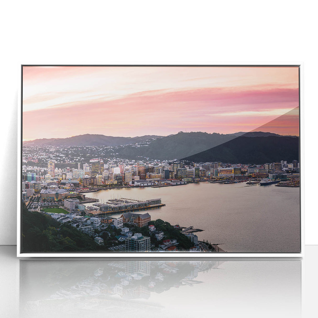 Art deco poster of Wellington, New Zealand skyline in muted gray and blue tones on framed acrylic.