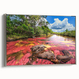 Framed canvas of a vintage-style Colombian landscape painting with vibrant colors on a black background.