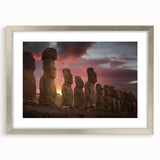 Textured art of Easter Island statues on silver-framed, matted print, ideal for bedroom wall decor.