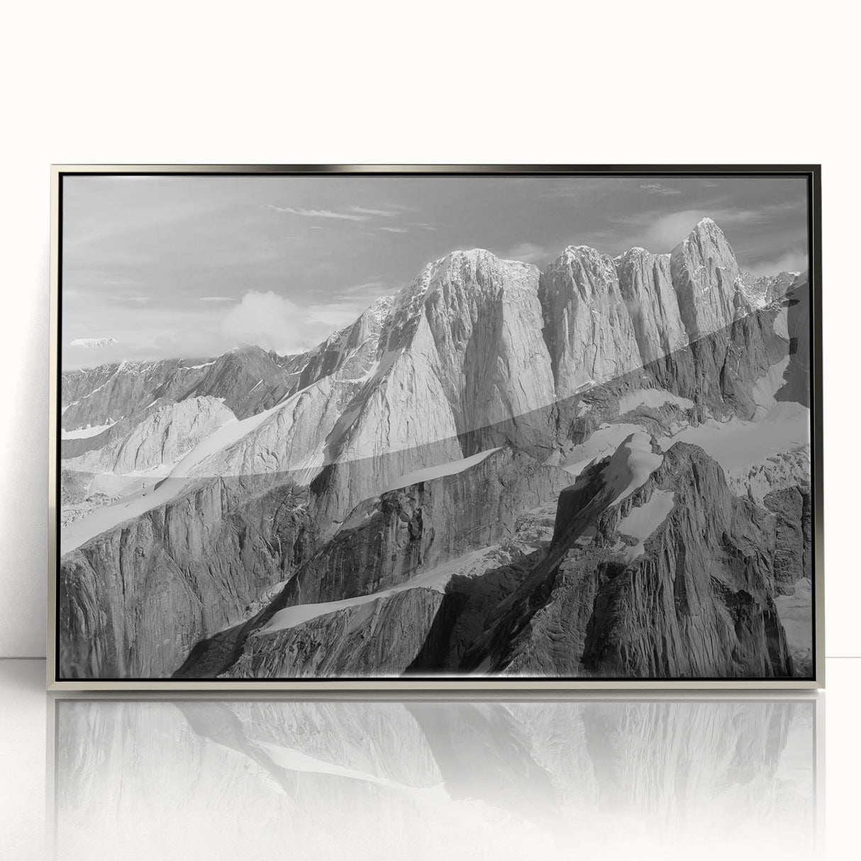 Mid-century modernist art depicting Denali National Park on a silver-framed acrylic print, with muted earth tones.