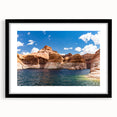 Extra large, textured abstract art print of Lake Powell with vibrant blues and reds, framed with a black mat.