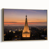 Framed canvas wall art featuring a vintage-style landscape of Berkeley, California, in muted gold and black tones.