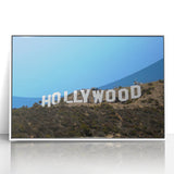 Art Deco poster of Hollywood, California scenery in muted colors on a framed acrylic, ideal for nursery wall art.