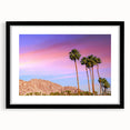 Extra large abstract art print of colorful, textured California palm scenery on a black framed canvas.
