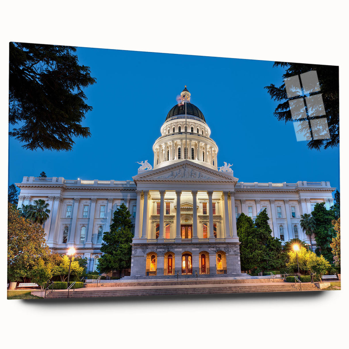 Large abstract wall art of Sacramento skyline in muted blues and greens on acrylic glass.
