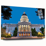 Large abstract wall art of Sacramento skyline in muted blues and greens on acrylic glass.