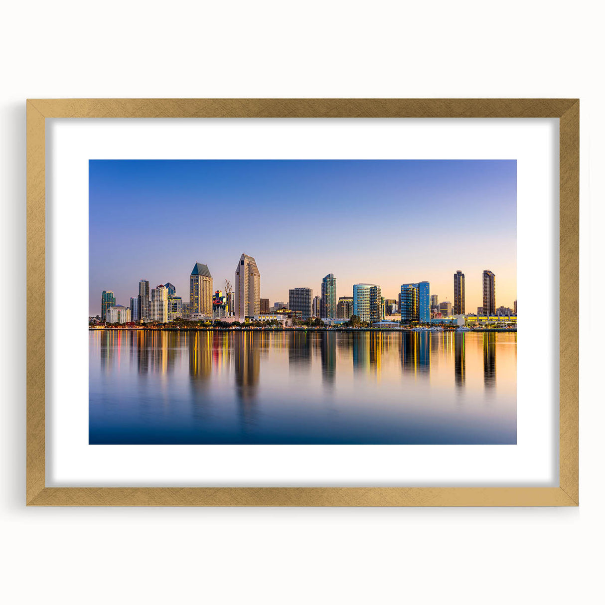 Extra large abstract art print of San Diego skyline in muted blue tones, framed in gold, suitable for living room decor.