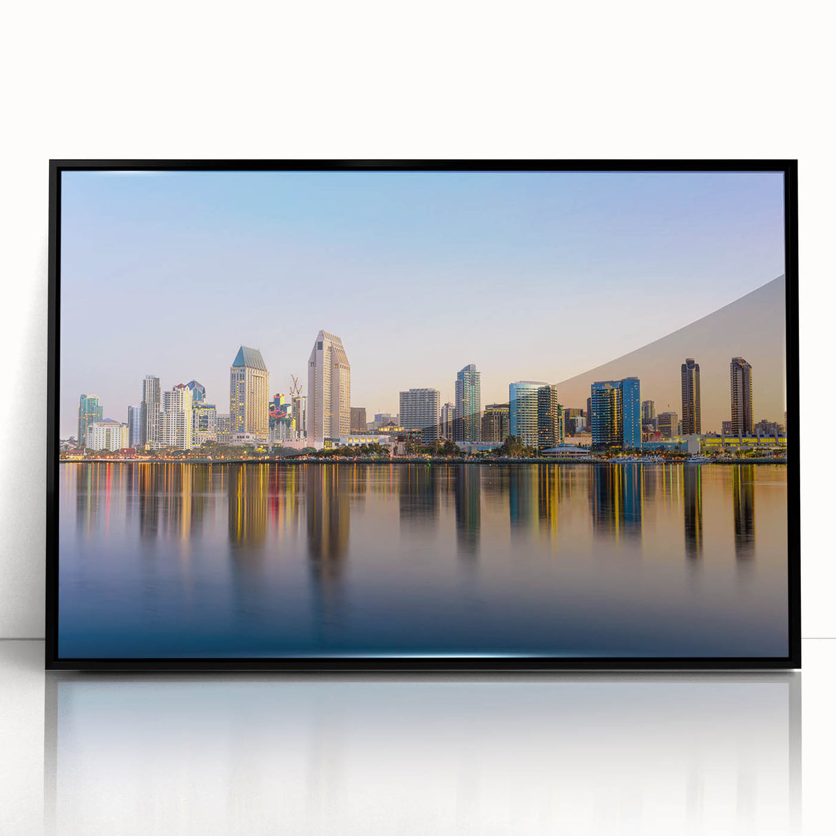 Large abstract wall art of San Diego skyline in muted gray tones, acrylic print framed in black.