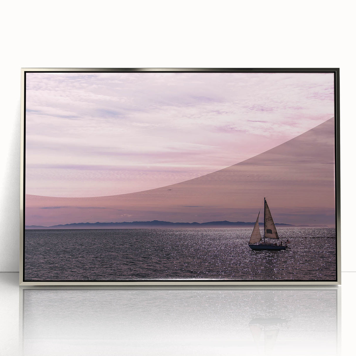 Mid-century modernist art of Santa Barbara coastline in muted blue and gray tones on a silver-framed acrylic print.