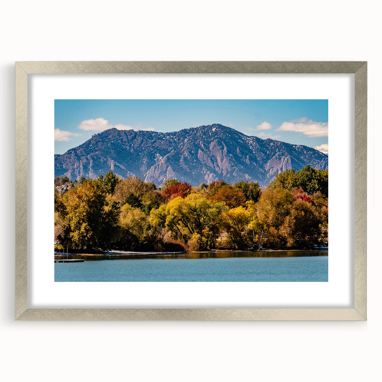 Textured abstract art print of Boulder, Colorado in muted earth tones, framed with a silver mat, suitable for bedroom decor.