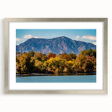 Textured abstract art print of Boulder, Colorado in muted earth tones, framed with a silver mat, suitable for bedroom decor.